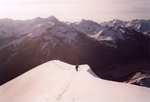 Adrien sur l'arête de la Grande Paréi, Grande Sassière et Tsanteleina au fond.